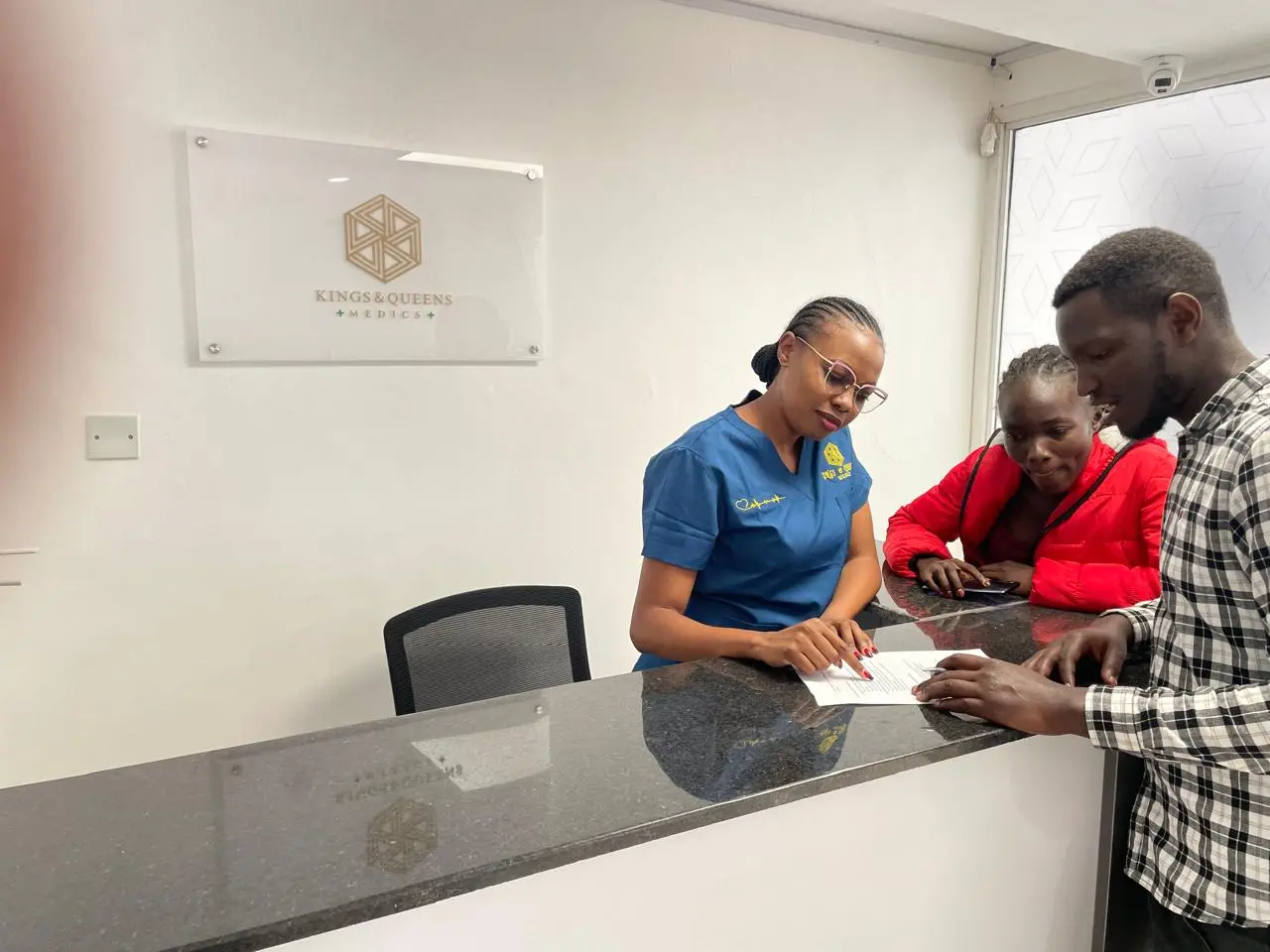 assisting customer at reception